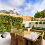 2 x Artificial Rattan Patio Planters Purple and White Faux Silk Pansies with Conifer/Cedar Topiary ideal for Home, Patio, Garden Outdoor Living 60cm/23.5in - Image 3